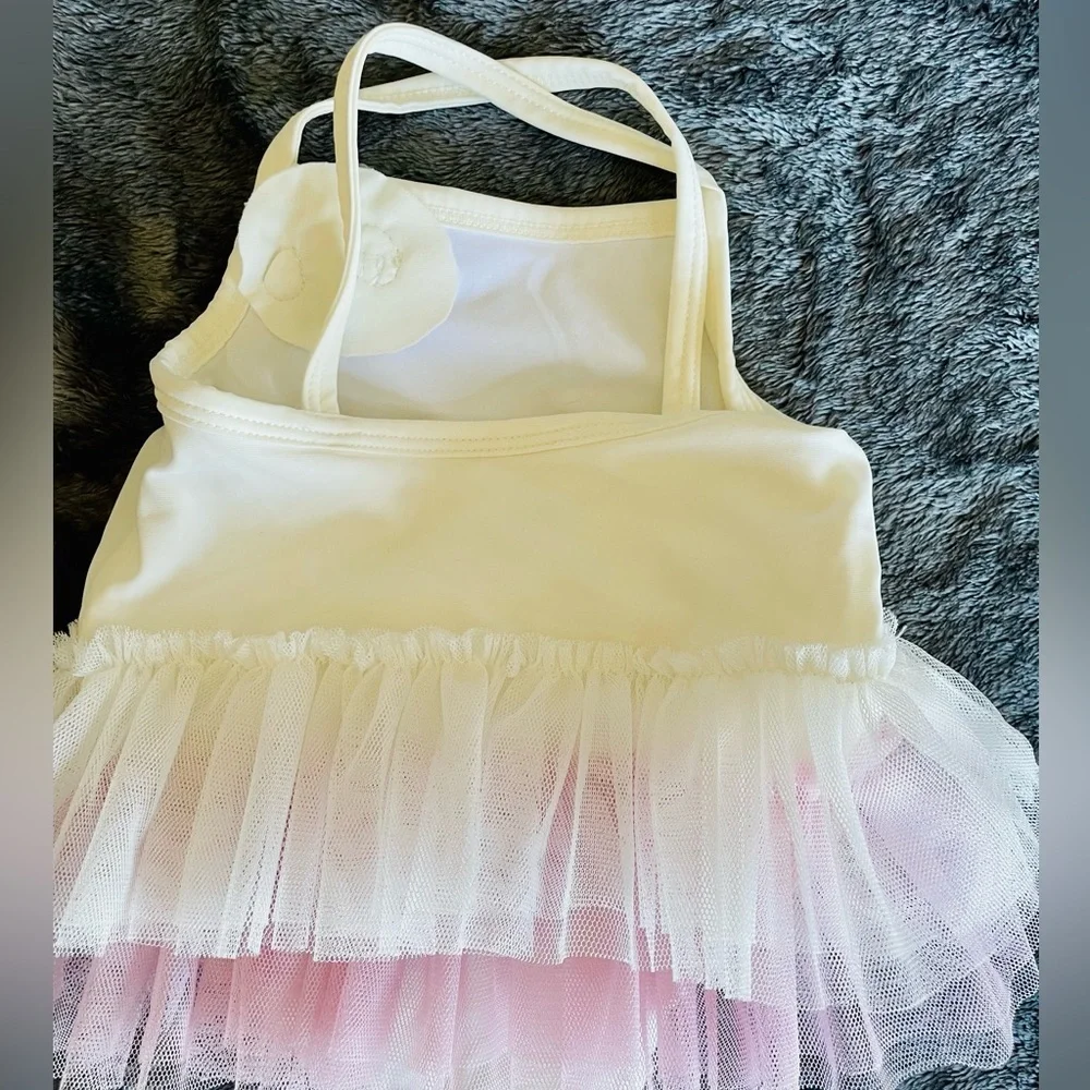 Adorable swimsuit size 3-6M with ruffles
